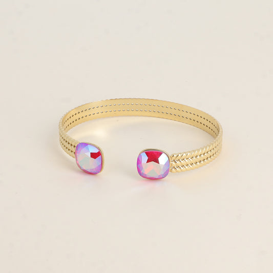 Jonc orné de cristaux de Swarovski® - Light siam shimmer Dimensions du jonc : 6 x 5 cm - Hauteur du jonc: 8 mm - Dimensions des cristaux : 12 x 12 mm