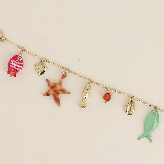 Bracelet - poissons nacré et en résine, cauri, cœur, perle 16+3 cm