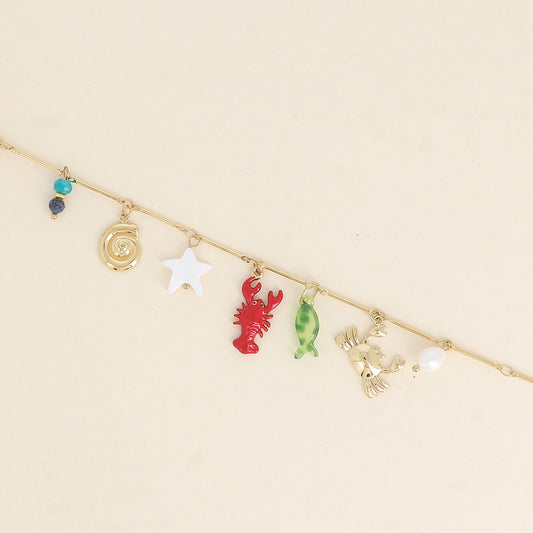 Bracelet - crabe, homard en émail, étoile de mer nacrée, coquillage escargot, poisson en résine, perle d'eau douce et pierres naturelles 17+3 cm