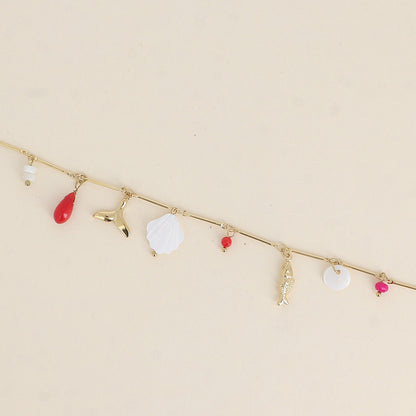 Bracelet - perles, poisson, queue de poisson et pastille nacrée 16+3 cm