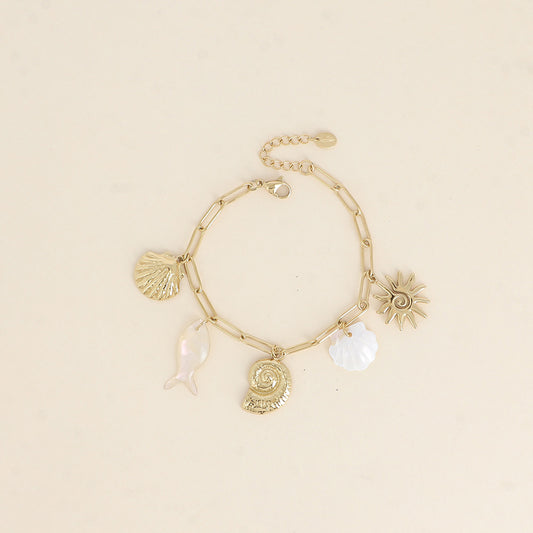 Bracelet - coquillages, soleil, poisson et coquillage nacré 17+3 cm