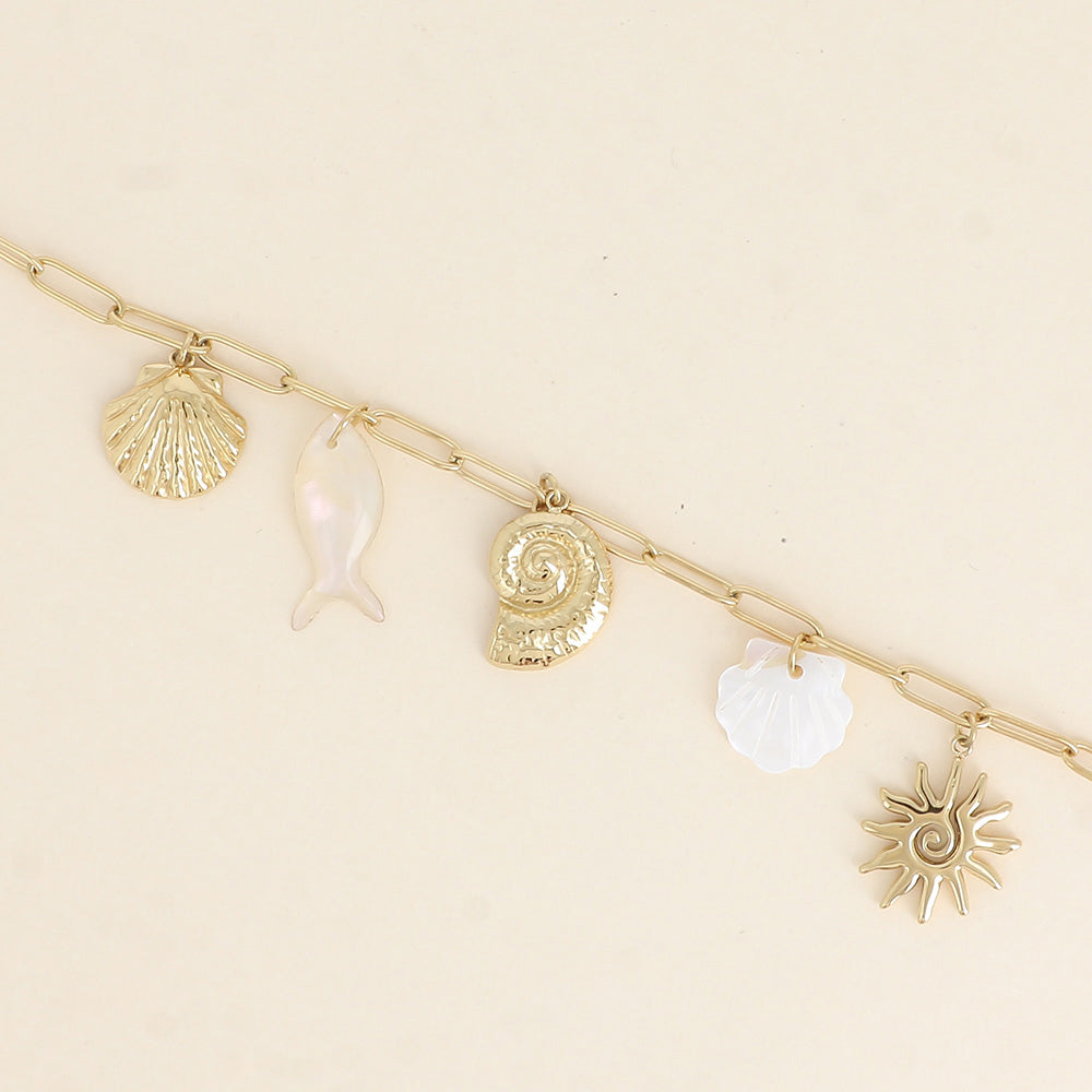 Bracelet - coquillages, soleil, poisson et coquillage nacré 17+3 cm