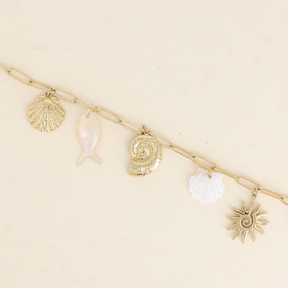 Bracelet - coquillages, soleil, poisson et coquillage nacré 17+3 cm