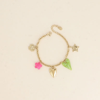 Bracelet - étoile martelée, cœurs, perle fleur et trèfle (17+3 cm)
