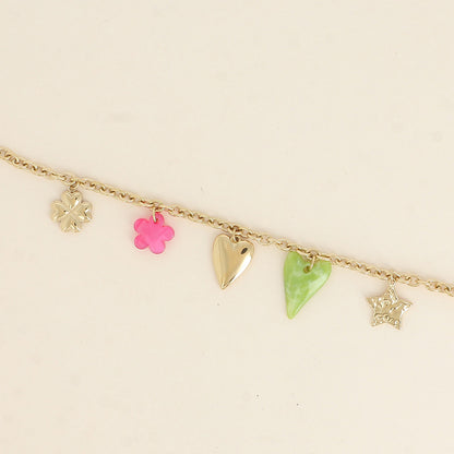 Bracelet - étoile martelée, cœurs, perle fleur et trèfle (17+3 cm)