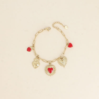 Bracelet - pendentifs cœurs, émail et perles rouges (17+3 cm)