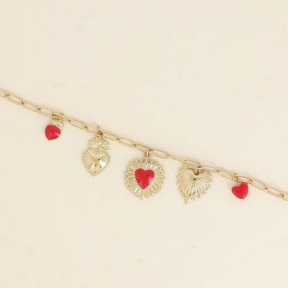 Bracelet - pendentifs cœurs, émail et perles rouges (17+3 cm)