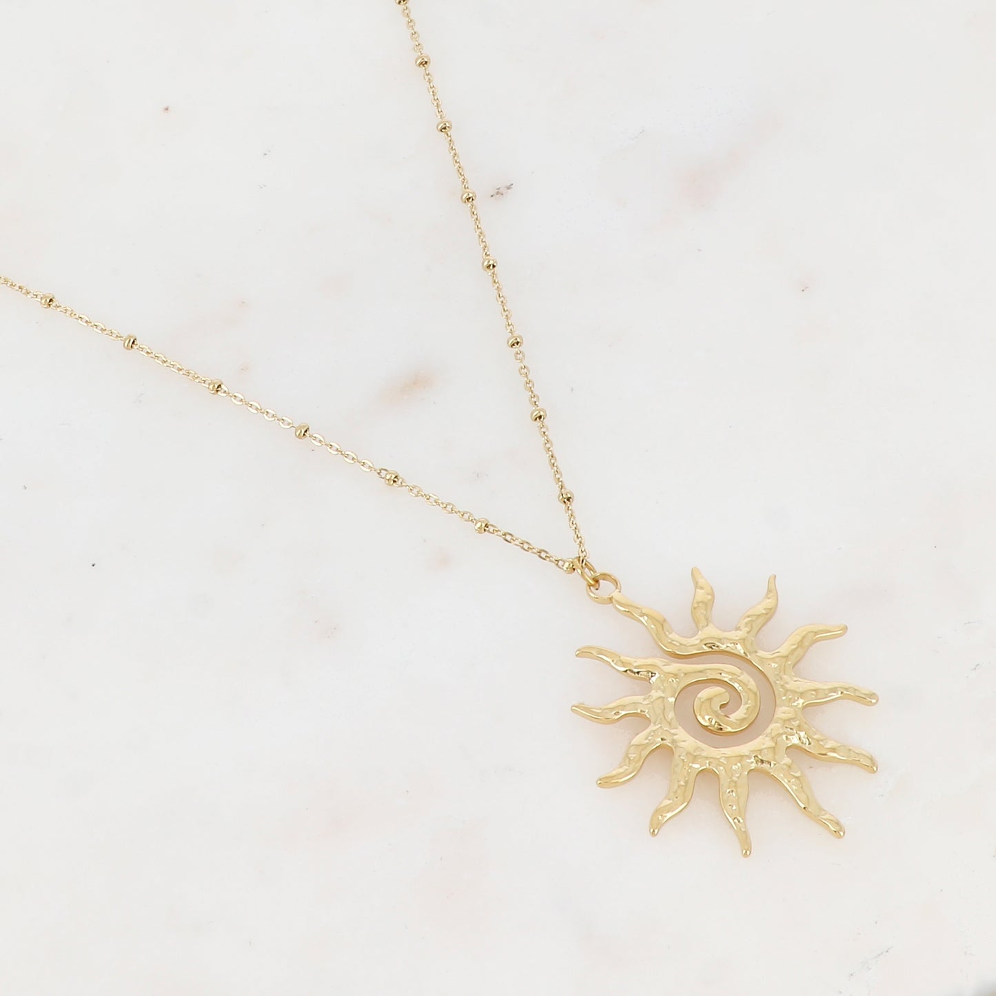 Sautoir avec pampille forme soleil (65+5CM)