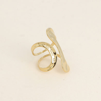 Bague ouverte large - formes ajourées et martelées