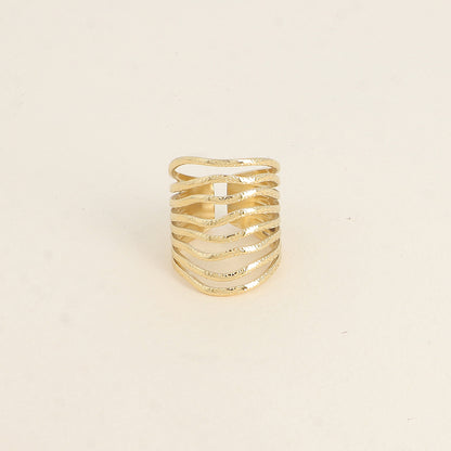 Bague large - 8 anneaux ondulés aux petits cercles gravés