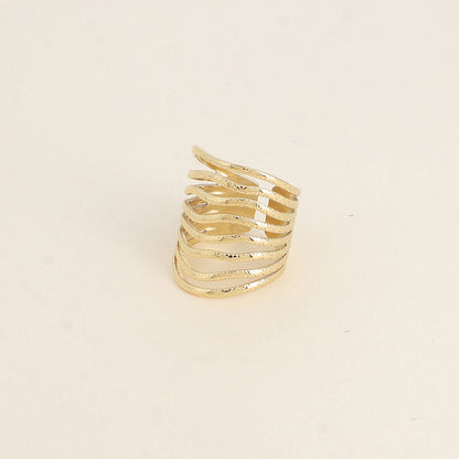 Bague large - 8 anneaux ondulés aux petits cercles gravés