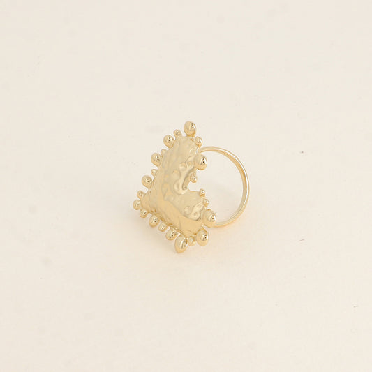 Bague - grand cœur martelé avec contour de petits ronds