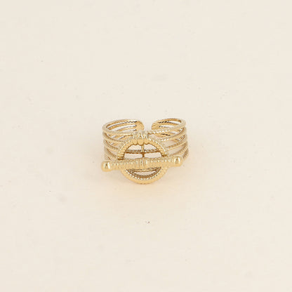 Bague - 5 anneaux fins ajourés striés, barre horizontale et anneau
