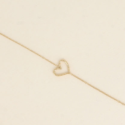 Bracelet - pendentif cœur ajouré (16+3 cm)