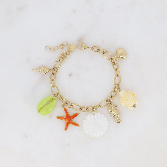 Bracelet - fleur nacrée, breloques marins (étoile de mer, tortue et cauri émaillés, coquillages) 17+3 cm