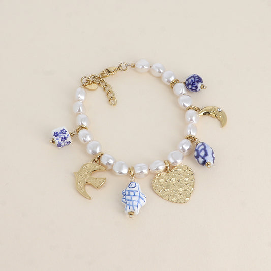 Bracelet sur fil - cœurs, soleil, oiseau, lune, perles en céramique émaillée (18+3 cm)