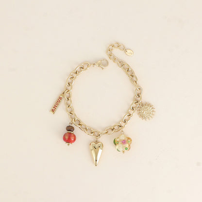 Bracelet - cœur, fleur en résine, plaquette AMOUR en émail, soleil et perle (17+3 cm)