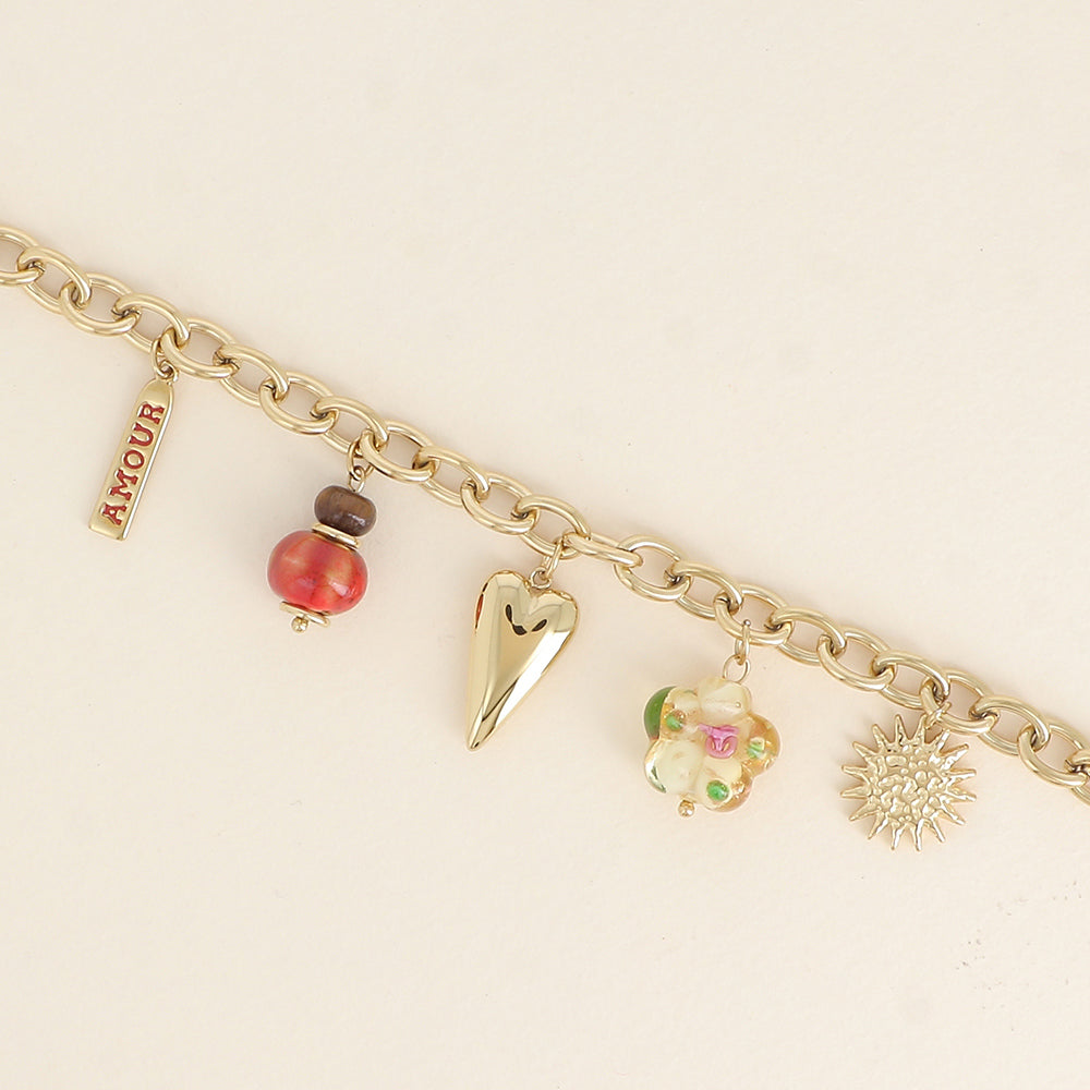 Bracelet - cœur, fleur en résine, plaquette AMOUR en émail, soleil et perle (17+3 cm)