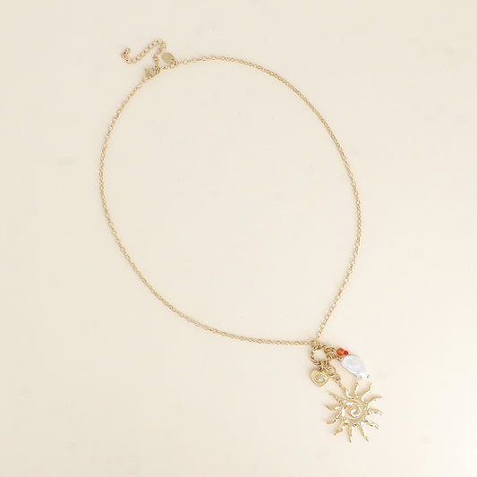 Collier - soleil, perle de résine blanche, cœur et œil 45+7 cm