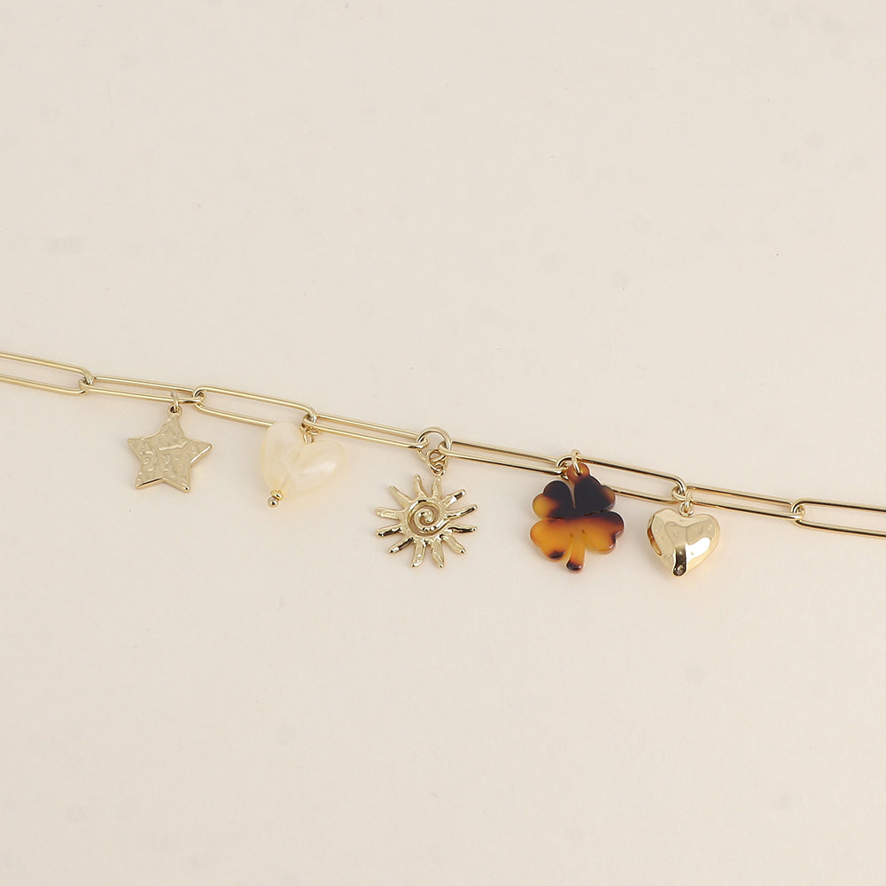 Bracelet - étoile martelée, cœur et trèfle en résine, soleil tourbillonnant, cœur martelé (17+3 cm)