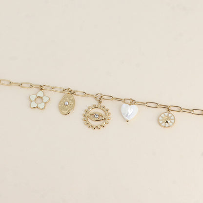 Bracelet - fleur en émail, soleils, cœur nacré, œil (17+3 cm)