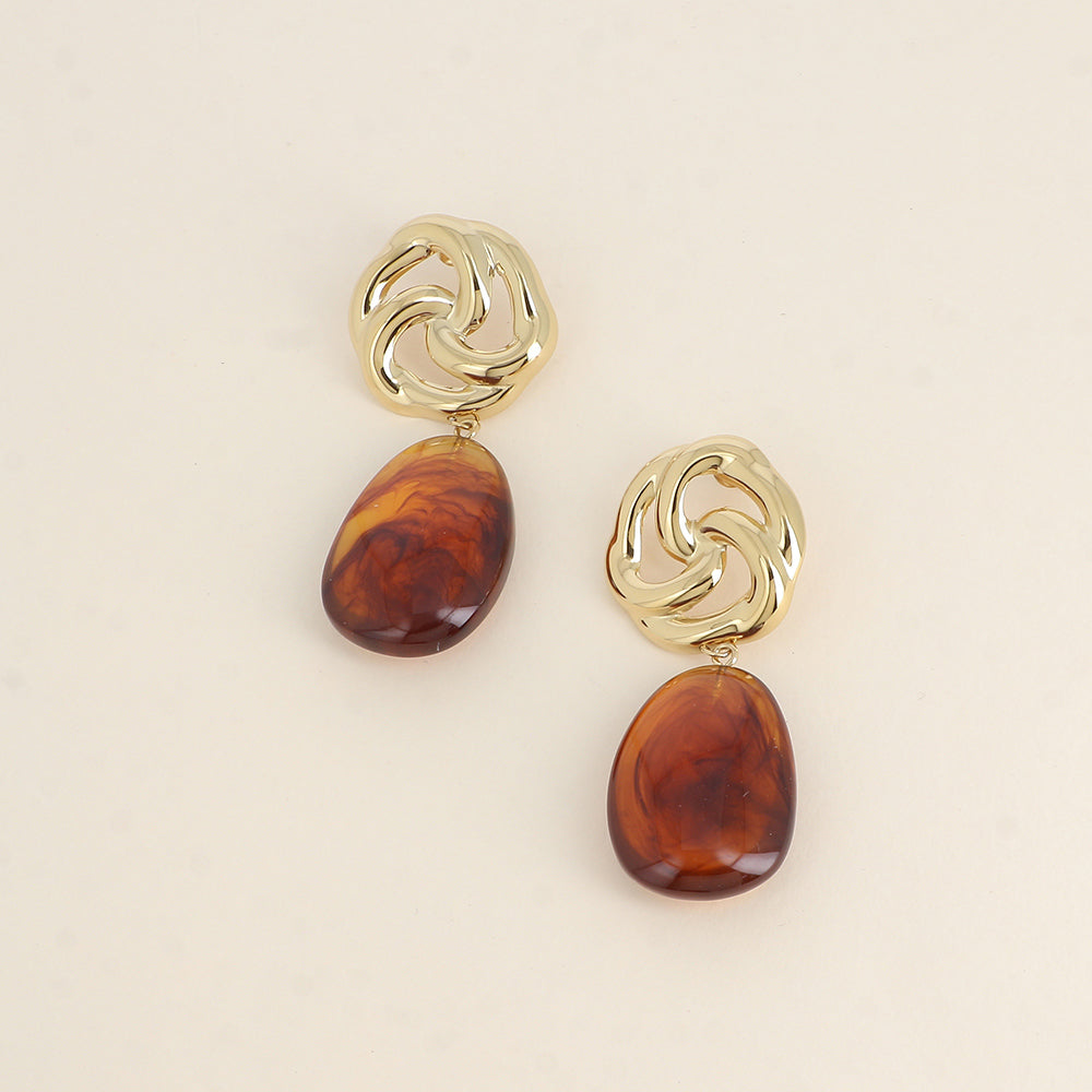 Boucles pendantes - fleur ajourée et pièce ovale en résine léopard 30x74 mm