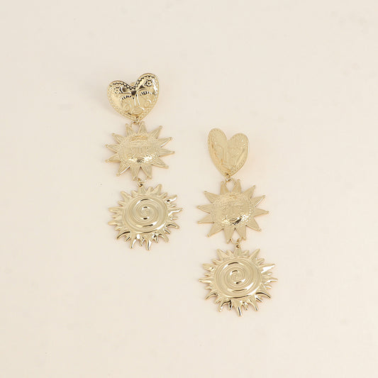 Boucles pendantes - 3 pièces (un cœur et 2 soleils) 30x83 mm