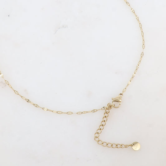 Sautoir avec pendentif anneau rond bombé et rainuré et perle d'eau douce (80+5CM)