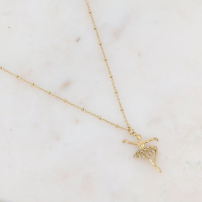 Collier doré avec pendentif forme danseuse embelli de strass 45+5 cm