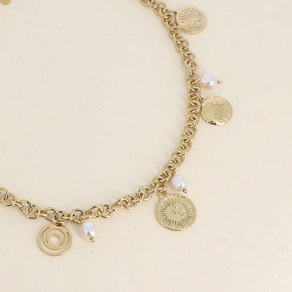 Collier - perles de résine blanche et pampilles rondes aux motifs de ciel étoilé, soleil et lune 39+7 cm