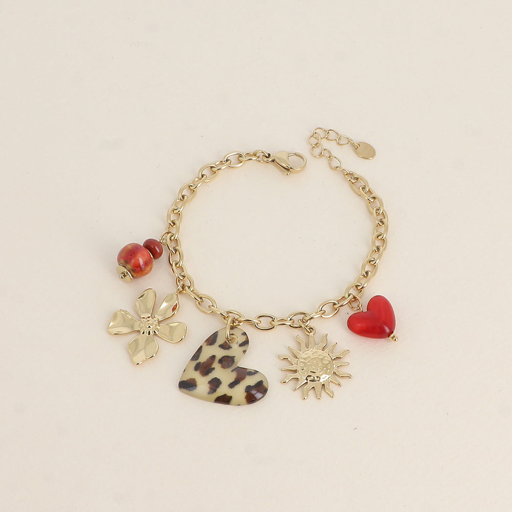 Bracelet - perles en céramique, cœurs en résine, soleil et fleur (17+3 cm)