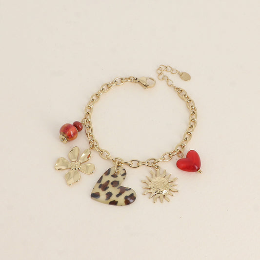 Bracelet - perles en céramique, cœurs en résine, soleil et fleur (17+3 cm)
