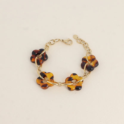 Bracelet - fleurs en résine léopard et maillons ovales (17+3 cm)