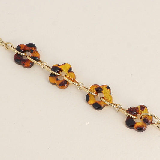 Bracelet - fleurs en résine léopard et maillons ovales (17+3 cm)