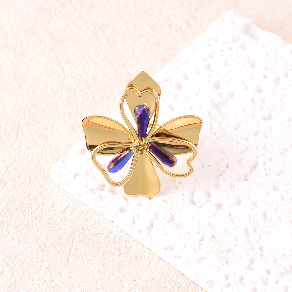 Bague avec pièce forme fleur sertie de perles en pâtes de verre - Bleu