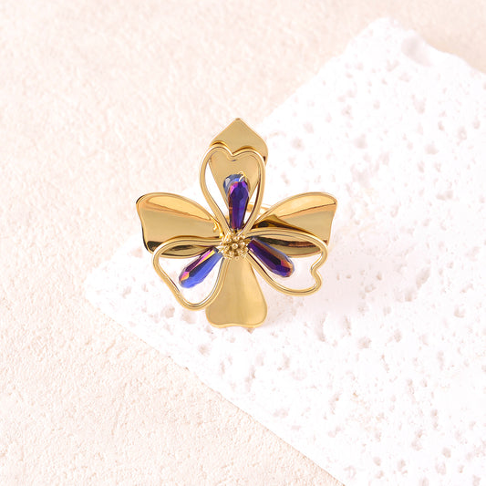 Bague avec pièce forme fleur sertie de perles en pâtes de verre - Bleu