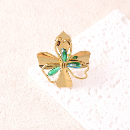 Bague avec pièce forme fleur sertie de perles en pâtes de verre - Vert