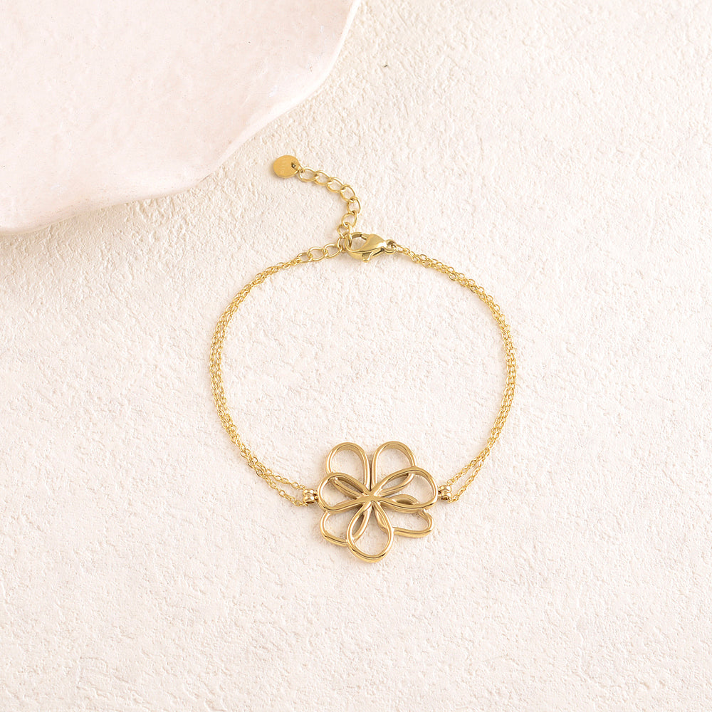 Bracelet double rangs avec pièce forme fleur ajourée