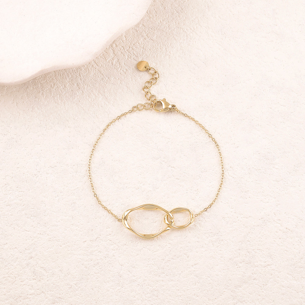Bracelet avec double anneaux géométriques entrelacés