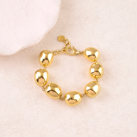 Bracelet avec pièces géométriques bombées effet miroir