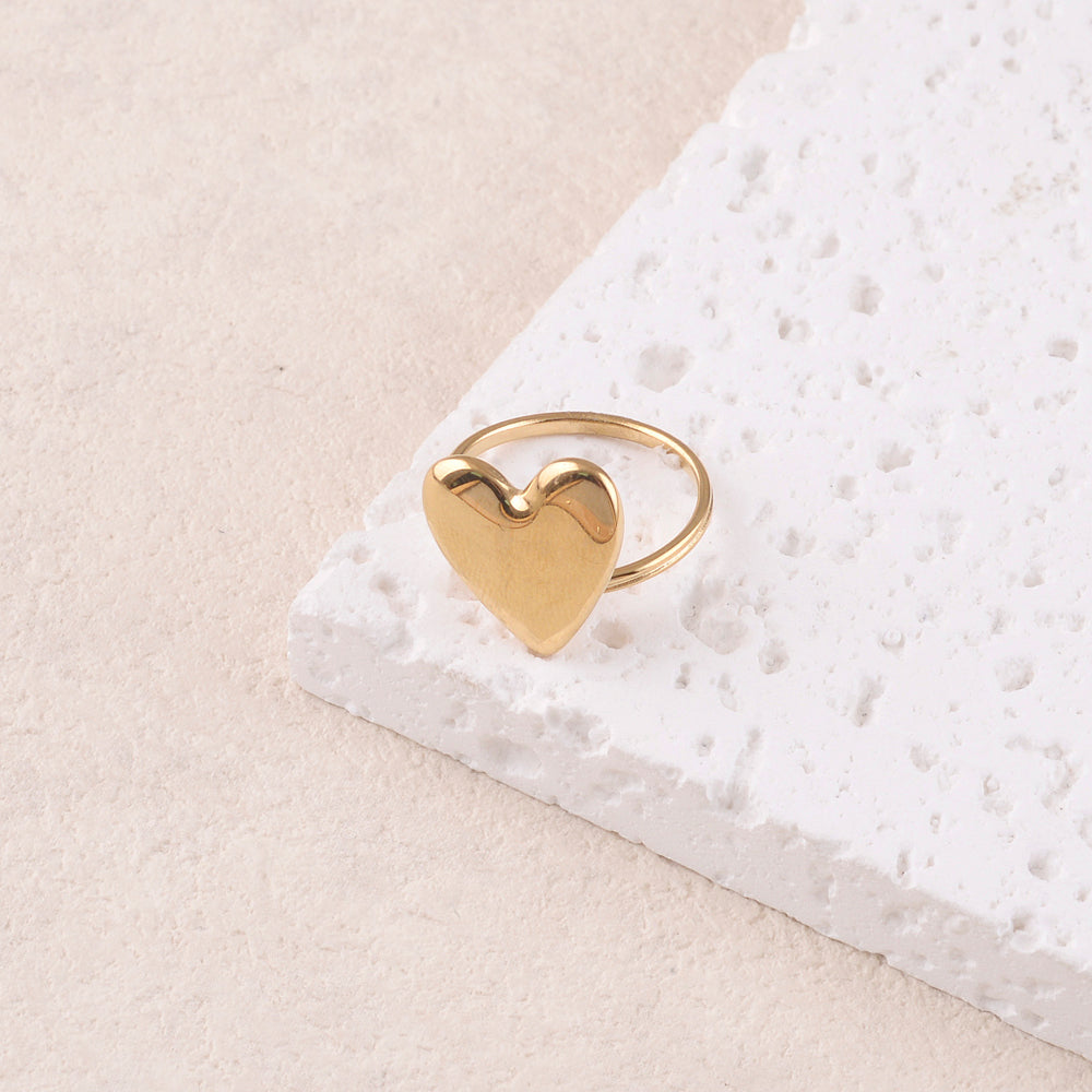 Bague avec pièce cœur lisse et effet miroir