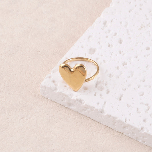 Bague avec pièce cœur lisse et effet miroir