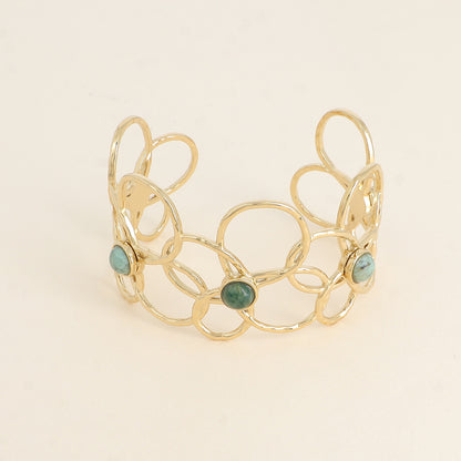 Manchette - 5 motifs floraux ajourés et pierres naturelles turquoises africaines - Dimensions : 6,5 x 5 cm - Hauteur : 40 mm