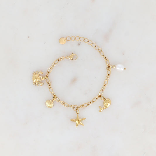 Bracelet en maille avec crabe, coquillages, étoile de mer, baleine et perle d'eau douce