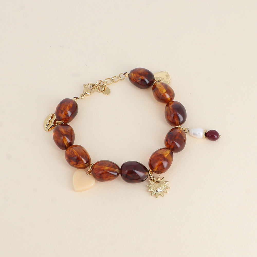Bracelet sur fil - perles en résine et pampilles en acier inoxydable (cœur, perles de résine, soleil, cœur en résine et bouche) (19+3 cm)