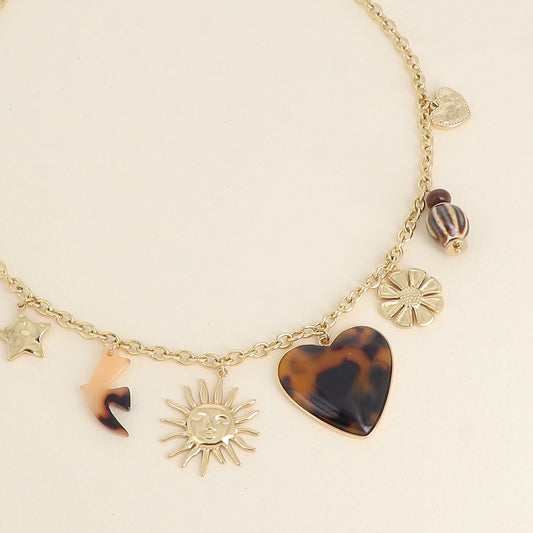 Collier - pendentifs (étoile, soleil, oiseau en résine, cœur en émail, fleur, perles, cœur) - Léopard 40+5 cm