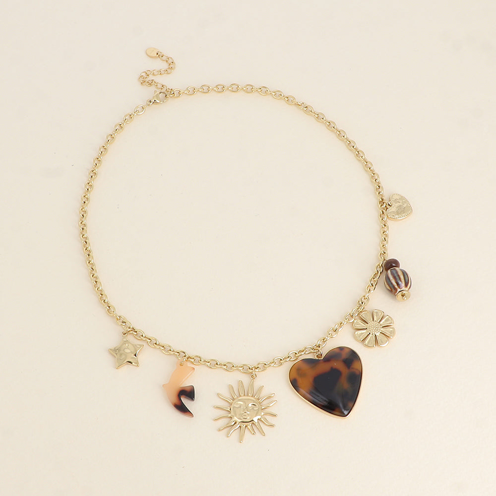 Collier - pendentifs (étoile, soleil, oiseau en résine, cœur en émail, fleur, perles, cœur) - Léopard 40+5 cm