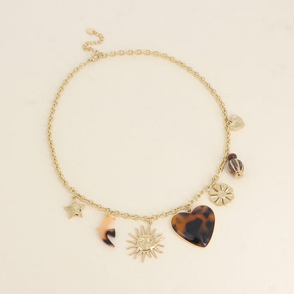 Collier - pendentifs (étoile, soleil, oiseau en résine, cœur en émail, fleur, perles, cœur) - Léopard 40+5 cm