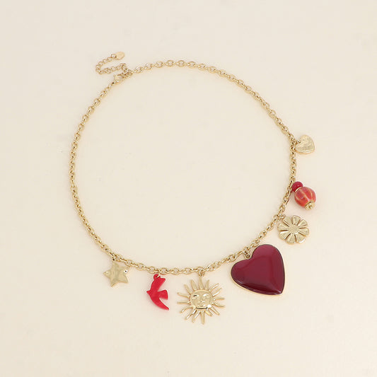 Collier - pendentifs (étoile, soleil, oiseau en résine, cœur en émail, fleur, perles, cœur) - Rouge 40+5 cm