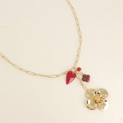 Collier - cœur en résine pailleté, fleur, trèfle en résine et perle 64+5 cm